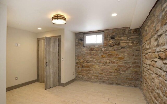 44 Lafayette Ave NE Unit 6, Grand Rapids, MI 49503 - spare room with baseboards and light wood finished floors