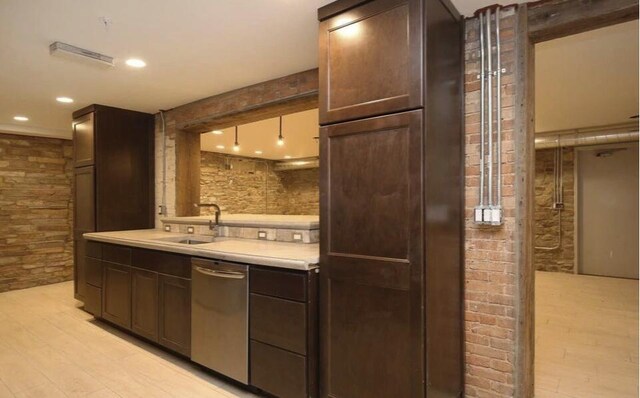 44 Lafayette Ave NE Unit 6, Grand Rapids, MI 49503 - kitchen with a sink, light countertops, dark brown cabinetry, recessed lighting, and stainless steel dishwasher