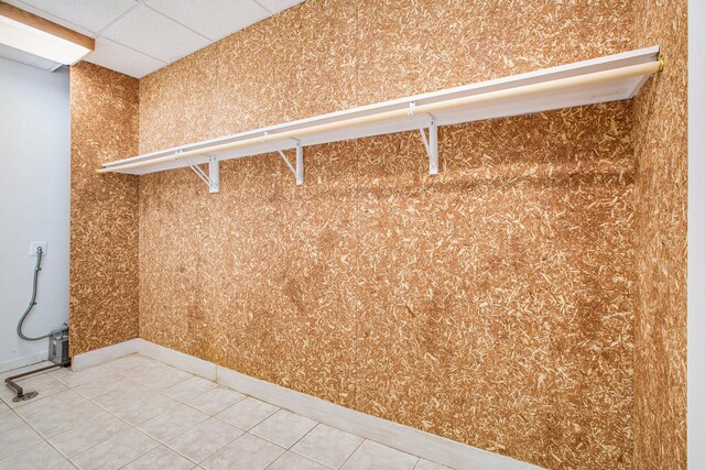 8023 Trail Rdg, Dexter, MI 48130 - spacious closet featuring light tile patterned flooring