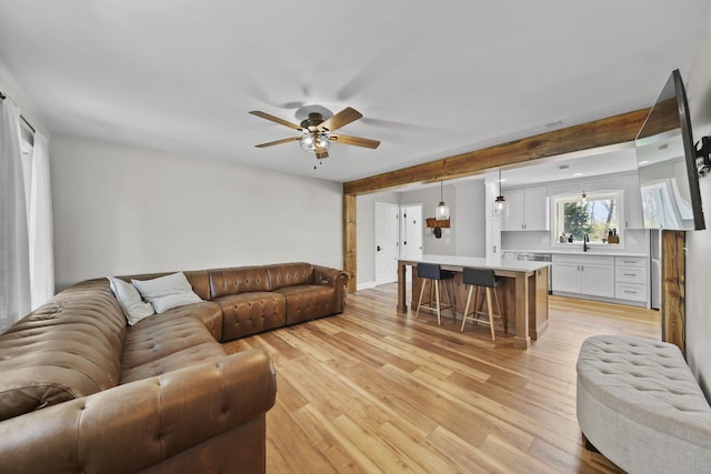 5427 Vrooman Rd, Jackson, MI 49201 - living area featuring ceiling fan and light wood-style flooring