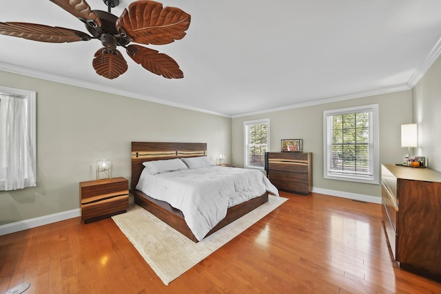 5427 Vrooman Rd, Jackson, MI 49201 - bedroom with ceiling fan, ornamental molding, wood-type flooring, and baseboards