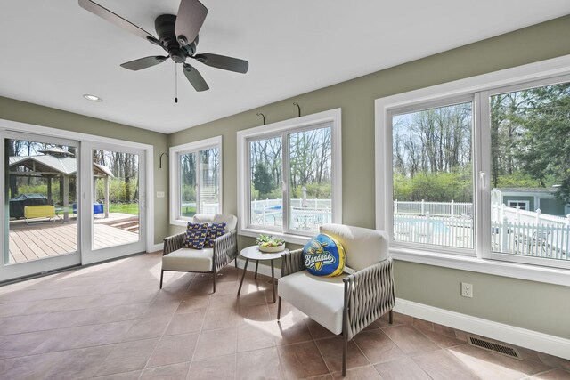 5427 Vrooman Rd, Jackson, MI 49201 - sunroom / solarium with visible vents, plenty of natural light, and baseboards