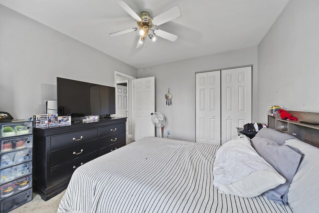 5427 Vrooman Rd, Jackson, MI 49201 - bedroom with a ceiling fan, light carpet, and a closet