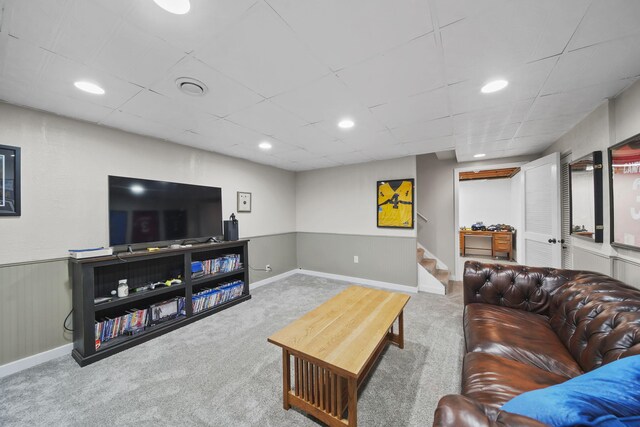 5427 Vrooman Rd, Jackson, MI 49201 - carpeted living room featuring recessed lighting, stairs, and baseboards