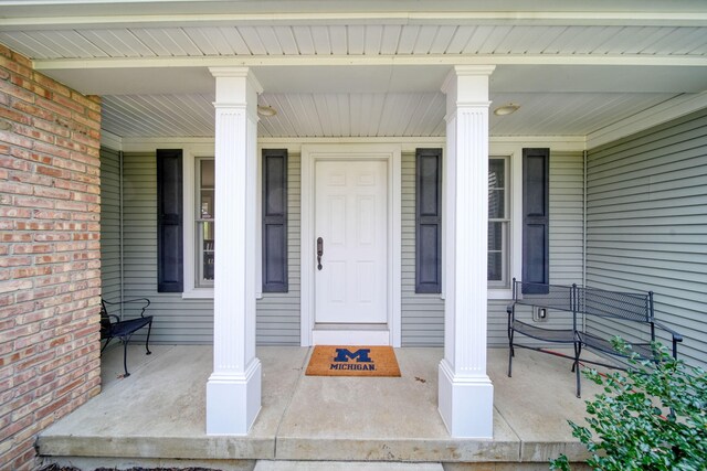 5427 Vrooman Rd, Jackson, MI 49201 - property entrance with a porch