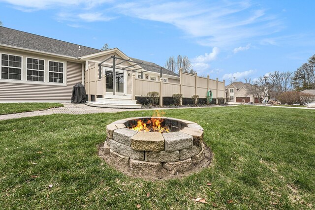 13548 Greenbriar Dr, Grand Haven, MI 49417 - view of yard with a fire pit
