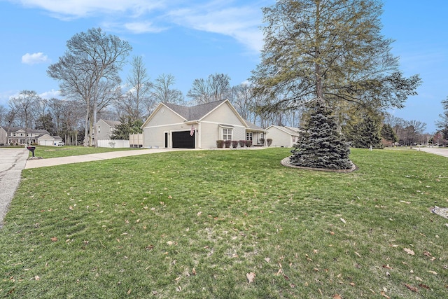13548 Greenbriar Dr, Grand Haven, MI 49417 - exterior space with a garage, a yard, driveway, and fence