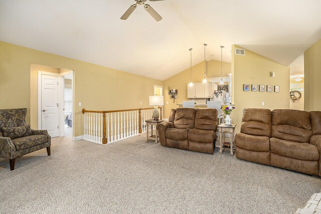 500 Mckinley, Three Rivers, MI 49093 - carpeted living room with visible vents, a ceiling fan, and vaulted ceiling