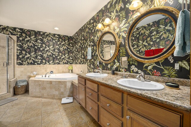 500 Mckinley, Three Rivers, MI 49093 - full bathroom with a garden tub, a sink, and wallpapered walls