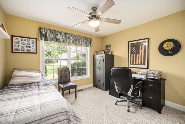 500 Mckinley, Three Rivers, MI 49093 - bedroom featuring visible vents, baseboards, ceiling fan, and light carpet