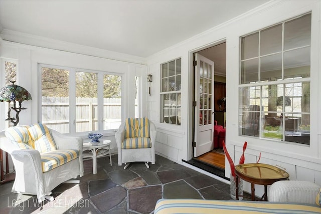 3020 Fulton St SE, Grand Rapids, MI 49506 - sunroom / solarium featuring ornamental molding and stone finish flooring