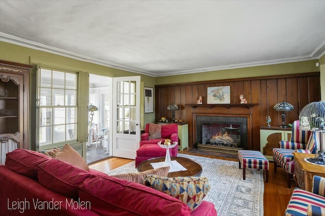 3020 Fulton St SE, Grand Rapids, MI 49506 - living area with wood finished floors, crown molding, and a tile fireplace