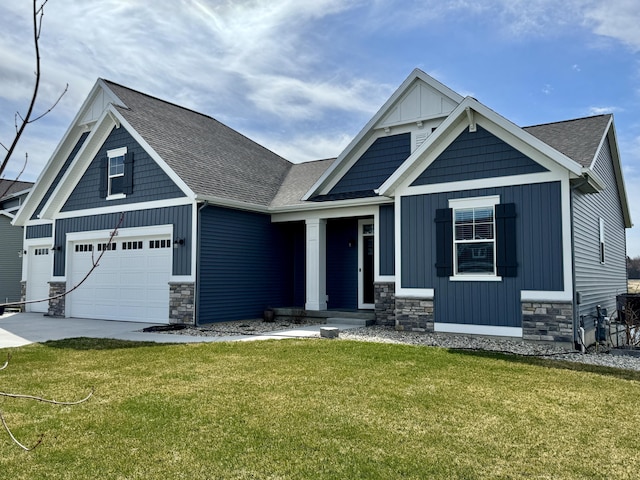 craftsman-style house featuring driveway, stone siding, board and batten siding, a front lawn, and a shingled roof