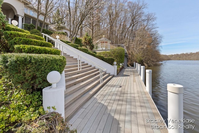 7635 Sandy Hollow Dr SE, Alto, MI 49302 - dock area featuring a water view, a gazebo, and stairs