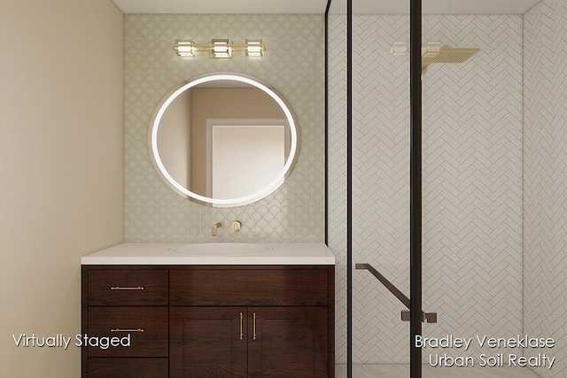 7635 Sandy Hollow Dr SE, Alto, MI 49302 - bathroom featuring wallpapered walls and vanity