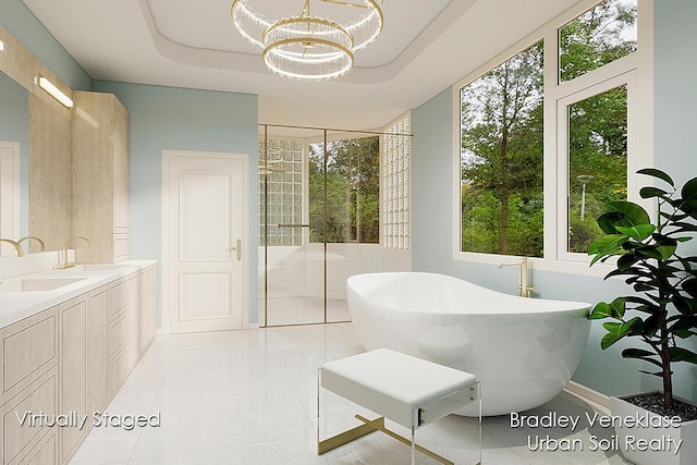 7635 Sandy Hollow Dr SE, Alto, MI 49302 - bathroom featuring a freestanding bath, healthy amount of natural light, a stall shower, and vanity