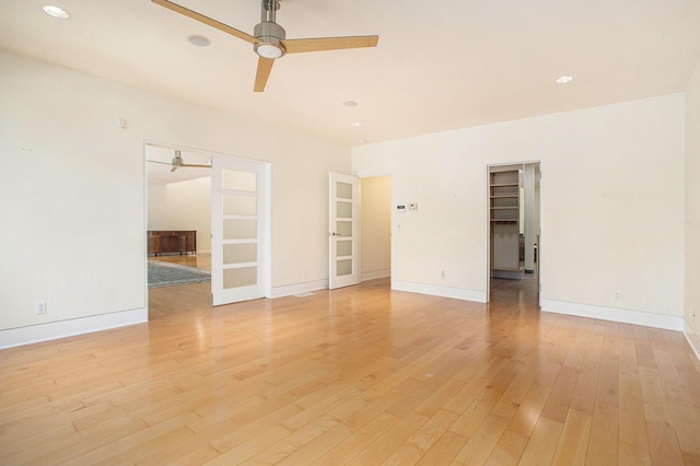 20 Hiawatha Dr, Battle Creek, MI 49015 - empty room featuring ceiling fan, light wood-style floors, recessed lighting, and french doors