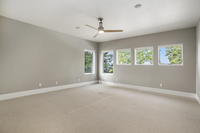 20 Hiawatha Dr, Battle Creek, MI 49015 - spare room with a ceiling fan and light colored carpet