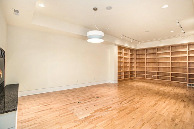 20 Hiawatha Dr, Battle Creek, MI 49015 - unfurnished living room featuring light wood-type flooring, track lighting, and recessed lighting