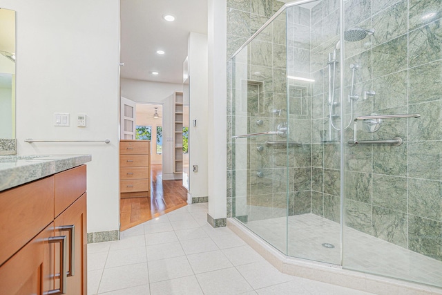 20 Hiawatha Dr, Battle Creek, MI 49015 - full bath with vanity, a shower stall, recessed lighting, and tile patterned flooring