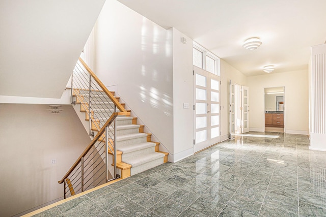 20 Hiawatha Dr, Battle Creek, MI 49015 - foyer with stairs and marble finish floors