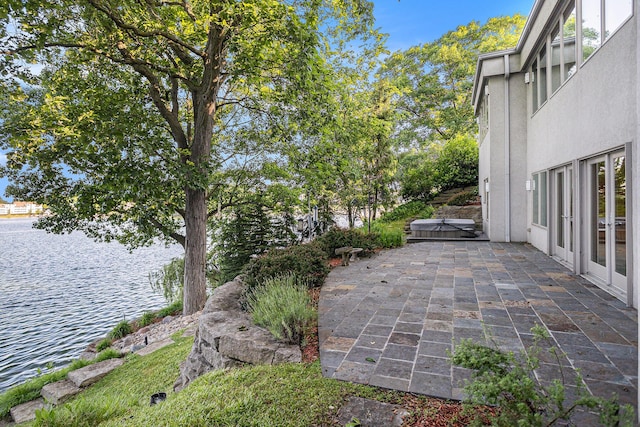 20 Hiawatha Dr, Battle Creek, MI 49015 - view of patio with a water view
