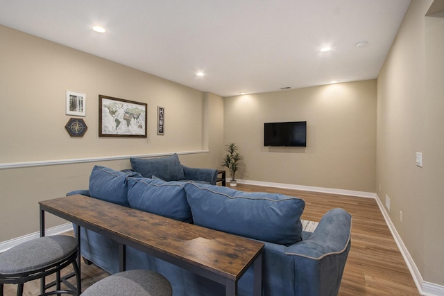 5371 S 4th St, Kalamazoo, MI 49009 - living room featuring wood finished floors, baseboards, and recessed lighting