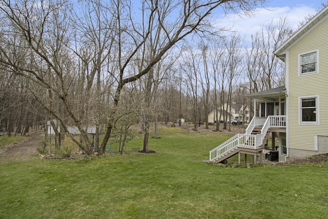 5371 S 4th St, Kalamazoo, MI 49009 - view of green lawn featuring stairway and a sunroom