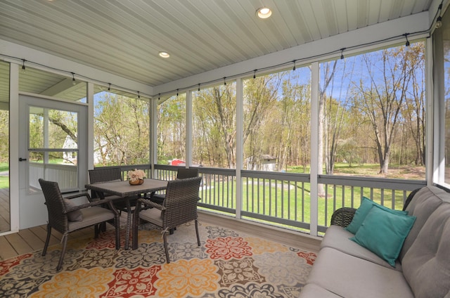 5371 S 4th St, Kalamazoo, MI 49009 - sunroom featuring outdoor dining space and view of scattered trees