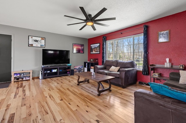 8524 E B Ave, Richland, MI 49083 - living area featuring wood-type flooring and ceiling fan