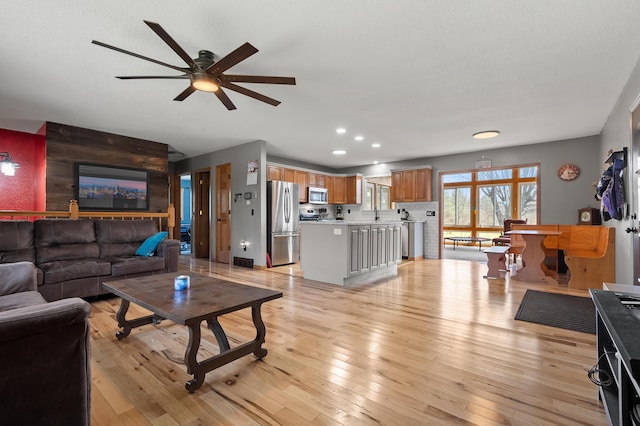 8524 E B Ave, Richland, MI 49083 - living room featuring ceiling fan, light wood finished floors, and recessed lighting