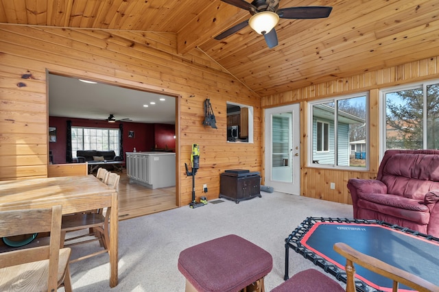 8524 E B Ave, Richland, MI 49083 - living room with a ceiling fan, wooden walls, carpet, and wooden ceiling