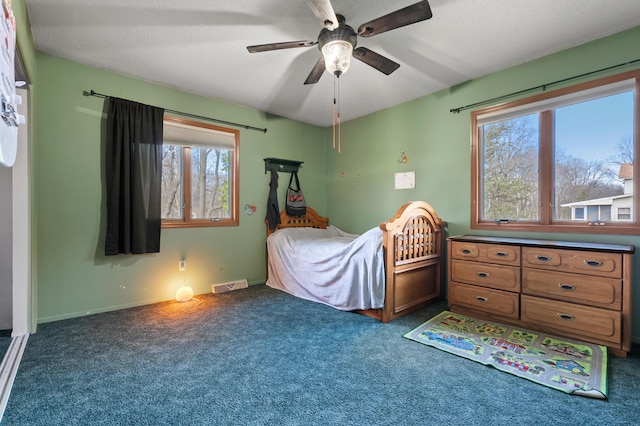 8524 E B Ave, Richland, MI 49083 - carpeted bedroom featuring a ceiling fan and baseboards