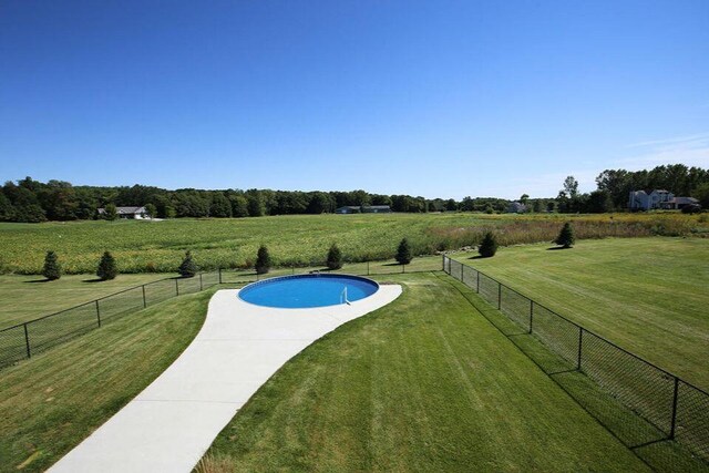 4459 36th St, Hamilton, MI 49419 - view of pool with fence, a lawn, and a fenced in pool