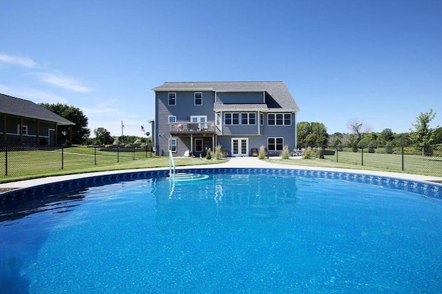 4459 36th St, Hamilton, MI 49419 - view of pool with a lawn, a deck, french doors, fence, and a fenced in pool