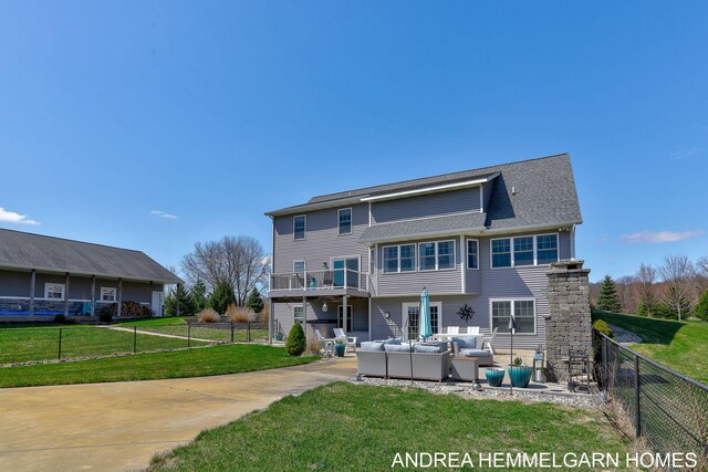 4459 36th St, Hamilton, MI 49419 - rear view of property with an outdoor hangout area, a lawn, a patio, and a fenced backyard