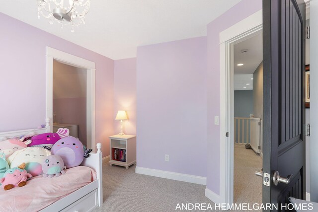 4459 36th St, Hamilton, MI 49419 - bedroom featuring light carpet, a notable chandelier, and baseboards