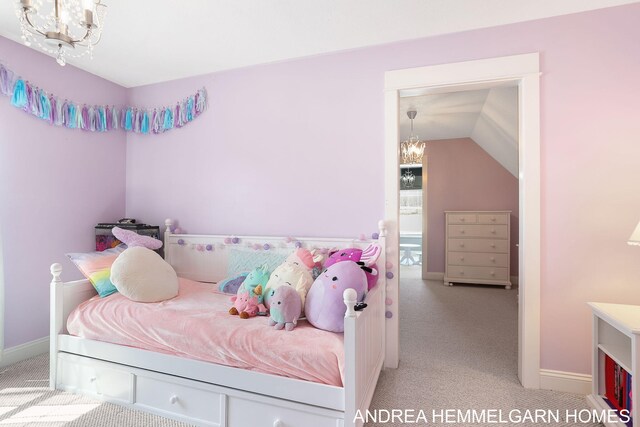 4459 36th St, Hamilton, MI 49419 - carpeted bedroom with baseboards, a notable chandelier, and lofted ceiling