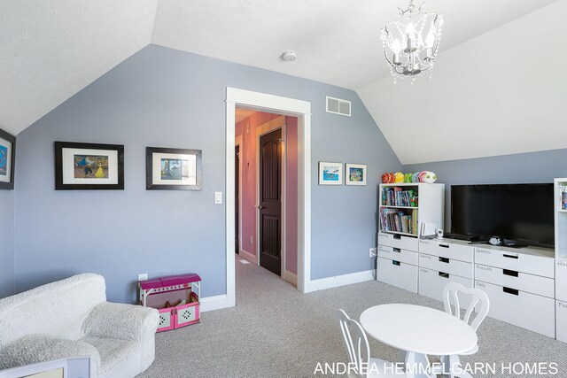 4459 36th St, Hamilton, MI 49419 - living area featuring vaulted ceiling, baseboards, a notable chandelier, carpet flooring, and visible vents
