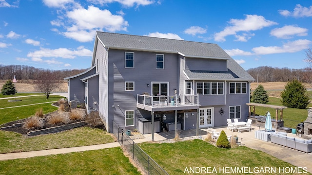 4459 36th St, Hamilton, MI 49419 - back of property with a lawn, fence, a deck, and a patio