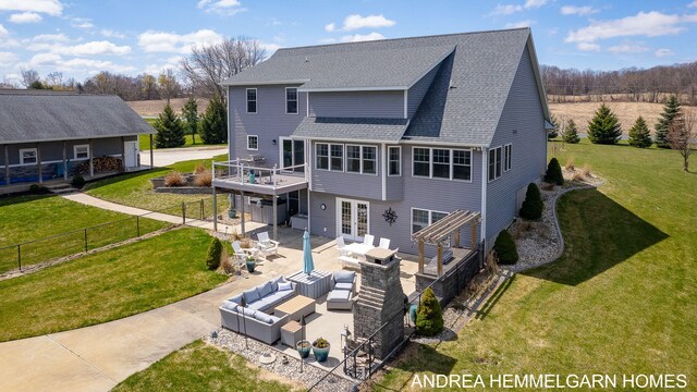 4459 36th St, Hamilton, MI 49419 - back of house featuring a patio area, outdoor lounge area, a yard, a wooden deck, and roof with shingles