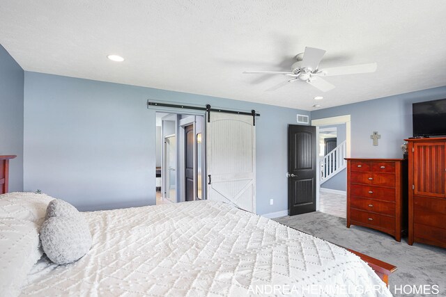 4459 36th St, Hamilton, MI 49419 - carpeted bedroom with a barn door, recessed lighting, visible vents, a ceiling fan, and baseboards