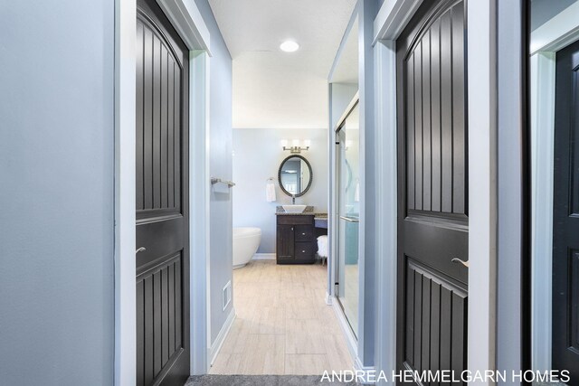4459 36th St, Hamilton, MI 49419 - hall with baseboards and a sink