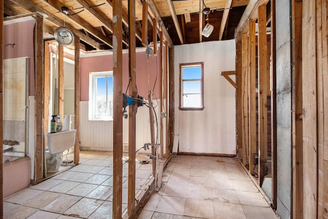 interior space featuring plenty of natural light and light tile patterned flooring