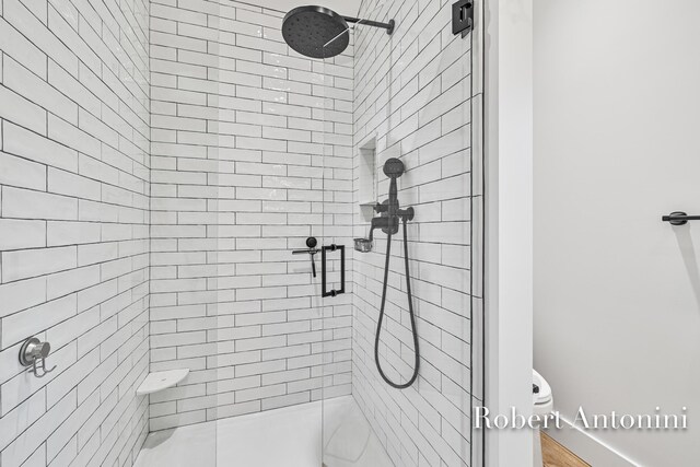 2301 Schimperle Dr NE, Grand Rapids, MI 49525 - bathroom with a stall shower and toilet