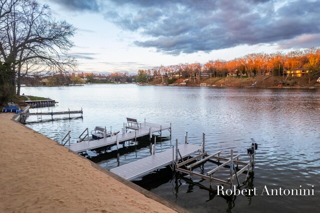 2301 Schimperle Dr NE, Grand Rapids, MI 49525 - dock with a water view and boat lift