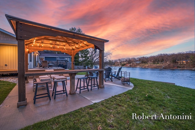 2301 Schimperle Dr NE, Grand Rapids, MI 49525 - view of patio featuring a gazebo and a water view