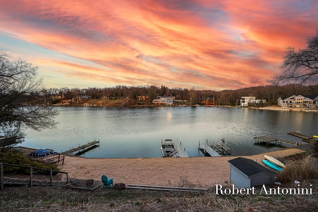 2301 Schimperle Dr NE, Grand Rapids, MI 49525 - dock area featuring a water view