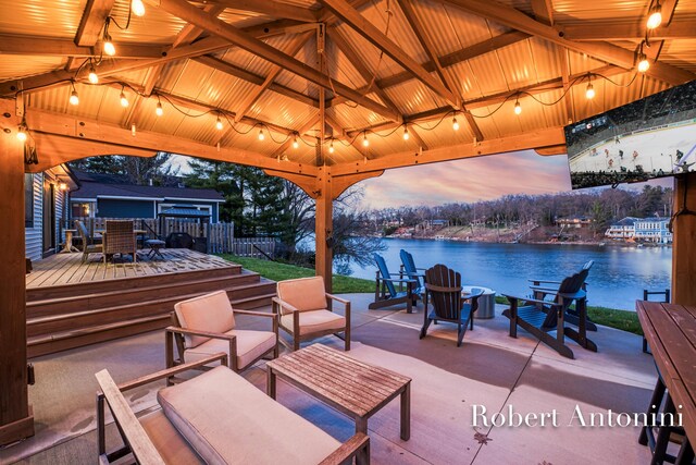 2301 Schimperle Dr NE, Grand Rapids, MI 49525 - view of patio featuring a gazebo, an outdoor living space, outdoor dining area, a deck, and fence