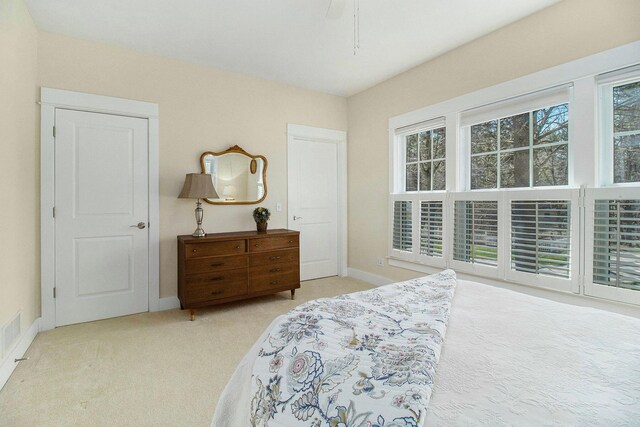8 Georgia Ct, Pentwater, MI 49449 - carpeted bedroom with baseboards